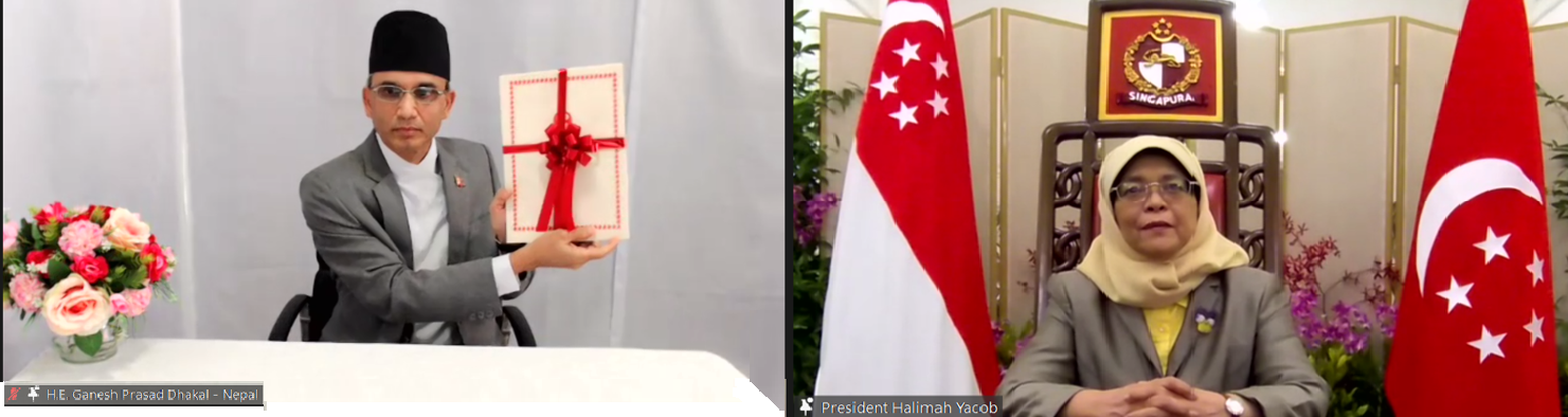 Two-pane video call: Ganesh Prasad Dhakal holding a wrapped gift, Halimah Yacob with Singapore flag.